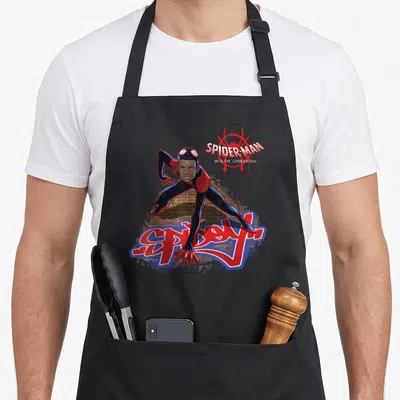 Spiderverse animal apron - Miles Morales crouching over Spidey graffiti text on brick background — shown on a black cotton canvas apron against a white background