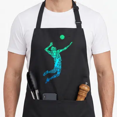 Youth volleyball apron - Green and blue mosaic silhouette of a jumping volleyball player formed by sports icons — shown on a black cotton canvas apron against a white background