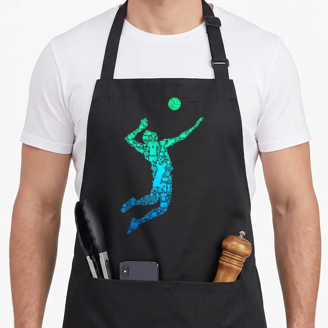 Youth volleyball apron - Green and blue mosaic silhouette of a jumping volleyball player formed by sports icons — shown on a black cotton canvas apron against a white background