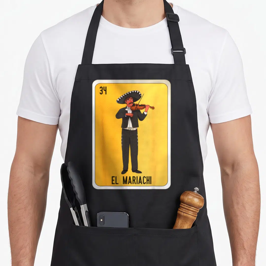 Card mexican apron - El Mariachi 34 card design with mariachi musician on yellow background — shown on a black cotton canvas apron against a white background