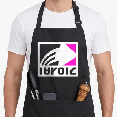 Zink novelty apron - Abstract logo with IAROIA text, white square, grey curves, pink triangle — shown on a black cotton canvas apron against a white background