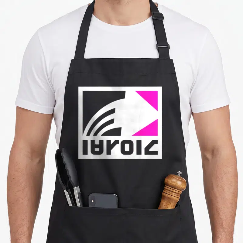 Zink novelty apron - Abstract logo with IAROIA text, white square, grey curves, pink triangle — shown on a black cotton canvas apron against a white background