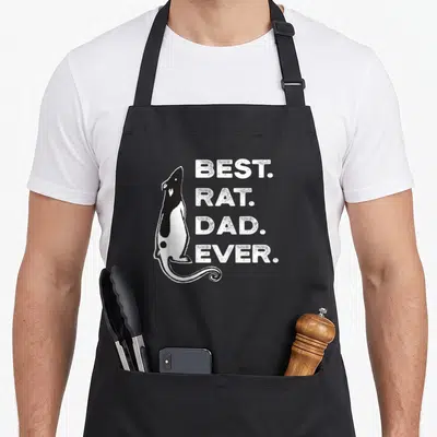 Funny rat dad apron - Black and white rat silhouette next to stacked text BEST. RAT. DAD. EVER — shown on a black cotton canvas apron against a white background