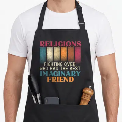 Religion friends apron - Stacked text reading RELIGIONS FIGHTING OVER WHO HAS THE BEST IMAGINARY FRIEND with colorful — shown on a black cotton canvas apron against a white background