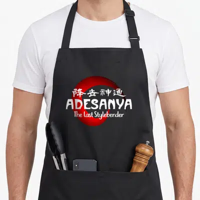 Bender fighter apron - White ADESANYA text and Chinese characters over a large red circle graphic — shown on a black cotton canvas apron against a white background