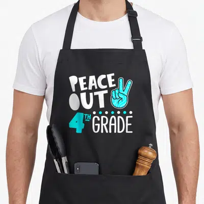 Peace grade fourth apron - White and blue peace sign hand with text PEACE OUT 4TH GRADE and five separating dots — shown on a black cotton canvas apron against a white background