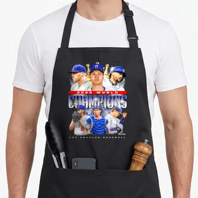 Final novelty apron - Stacked 2025 World Champions Los Angeles Baseball text with six player portraits and golden crown — shown on a black cotton canvas apron against a white background