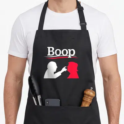 Boop us aprons - White and red silhouettes touching noses under the word Boop — shown on a black cotton canvas apron against a white background