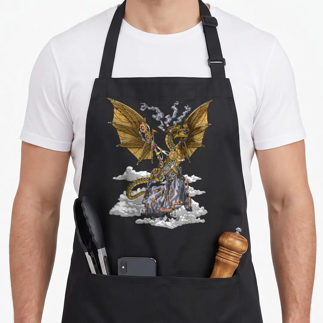 Dragon mechanical apron - Steampunk dragon with mechanical gears standing on a rocky peak amidst clouds — shown on a black cotton canvas apron against a white background
