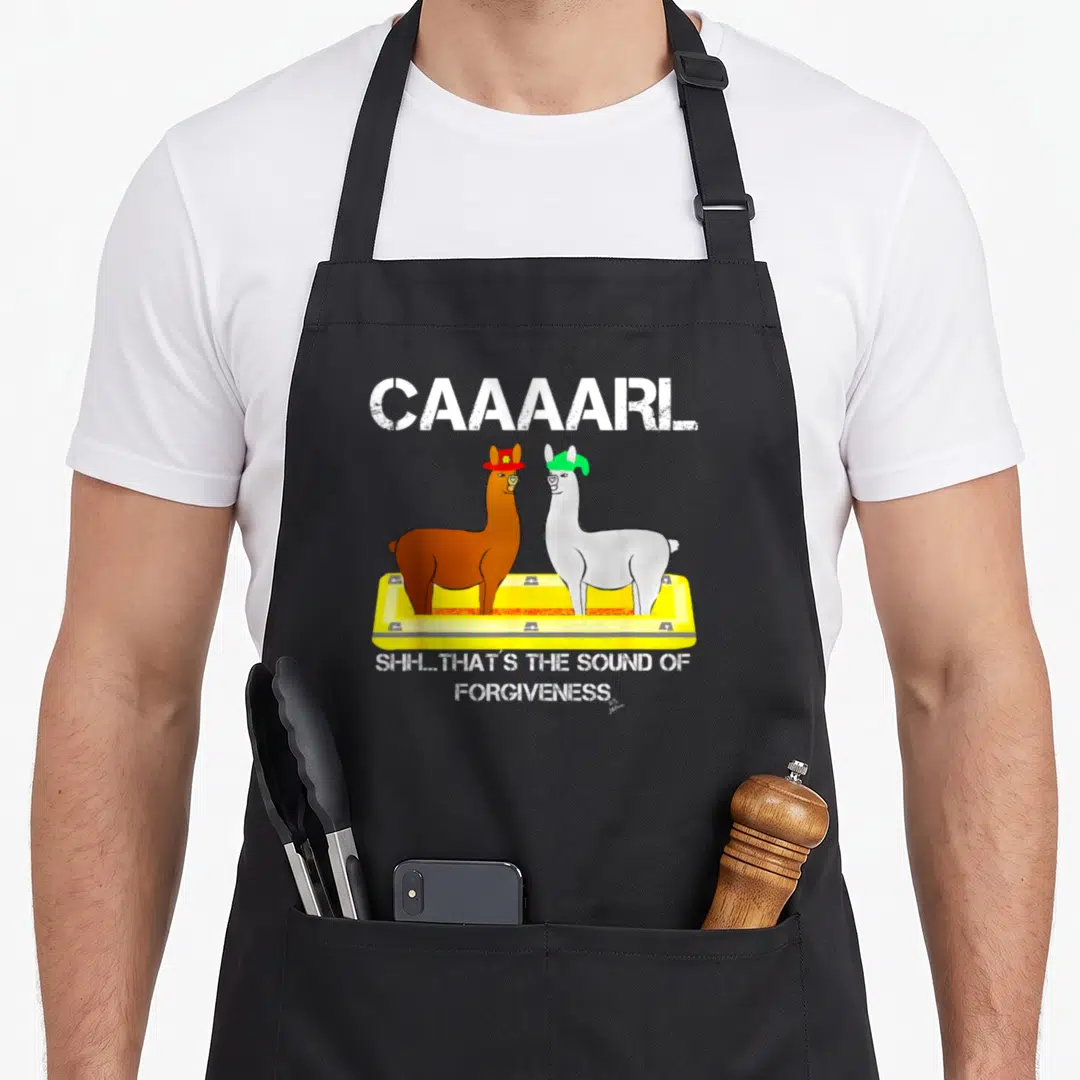 Lamas llama dad apron - Two llamas in yellow tray with CAAAARL and forgiveness text — shown on a black cotton canvas apron against a white background