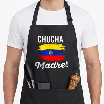 Camiseta pride apron - Brush stroke Ecuador flag with white CHUCHA Madre typography and coat of arms — shown on a black cotton canvas apron against a white background