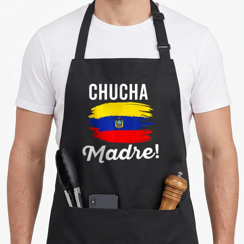 Camiseta pride apron - Brush stroke Ecuador flag with white CHUCHA Madre typography and coat of arms — shown on a black cotton canvas apron against a white background