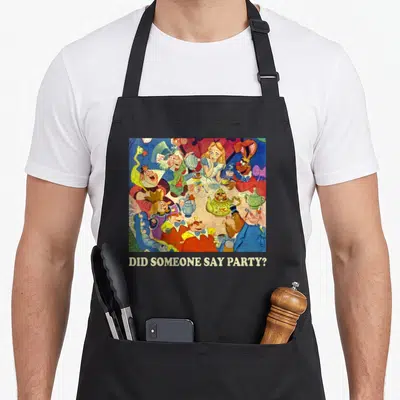 Someone alice wonderland apron - Cartoon tea party characters with text DID SOMEONE SAY PARTY? on black fabric — shown on a black cotton canvas apron against a white background