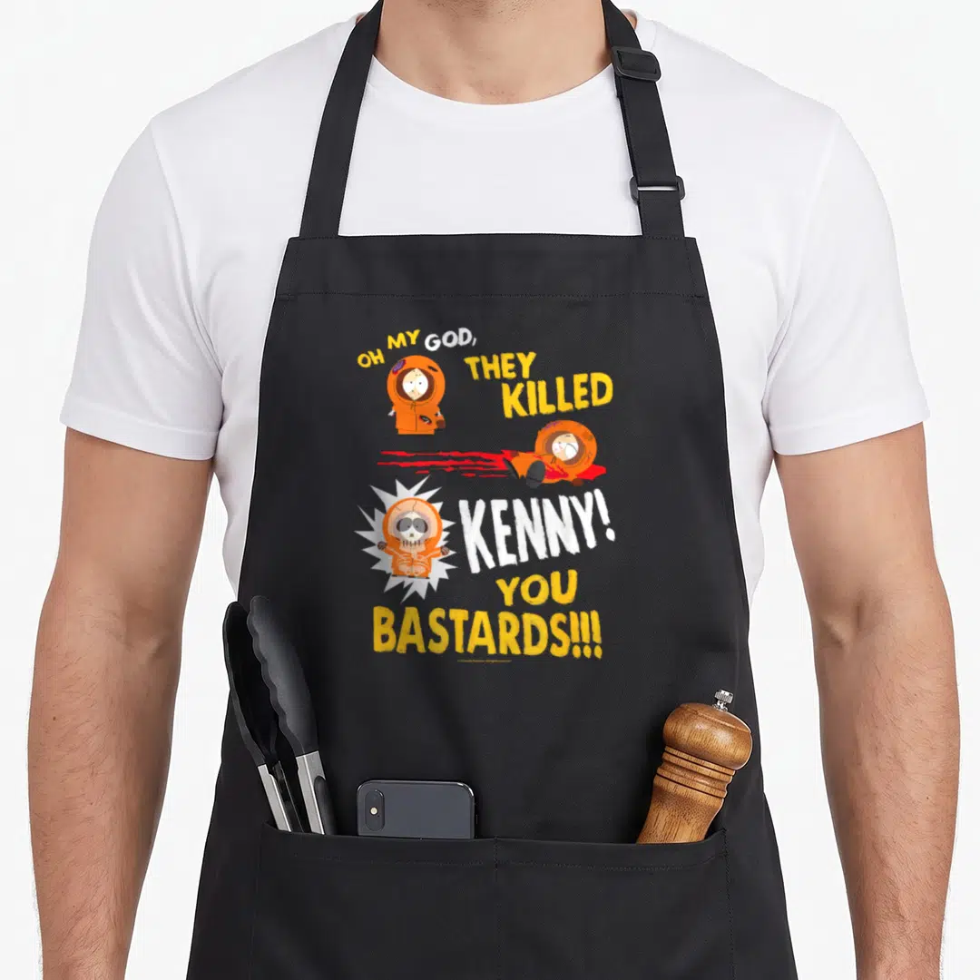 They park apron - OH MY GOD THEY KILLED KENNY YOU BASTARDS text with three orange parka figures in yellow and white — shown on a black cotton canvas apron against a white background
