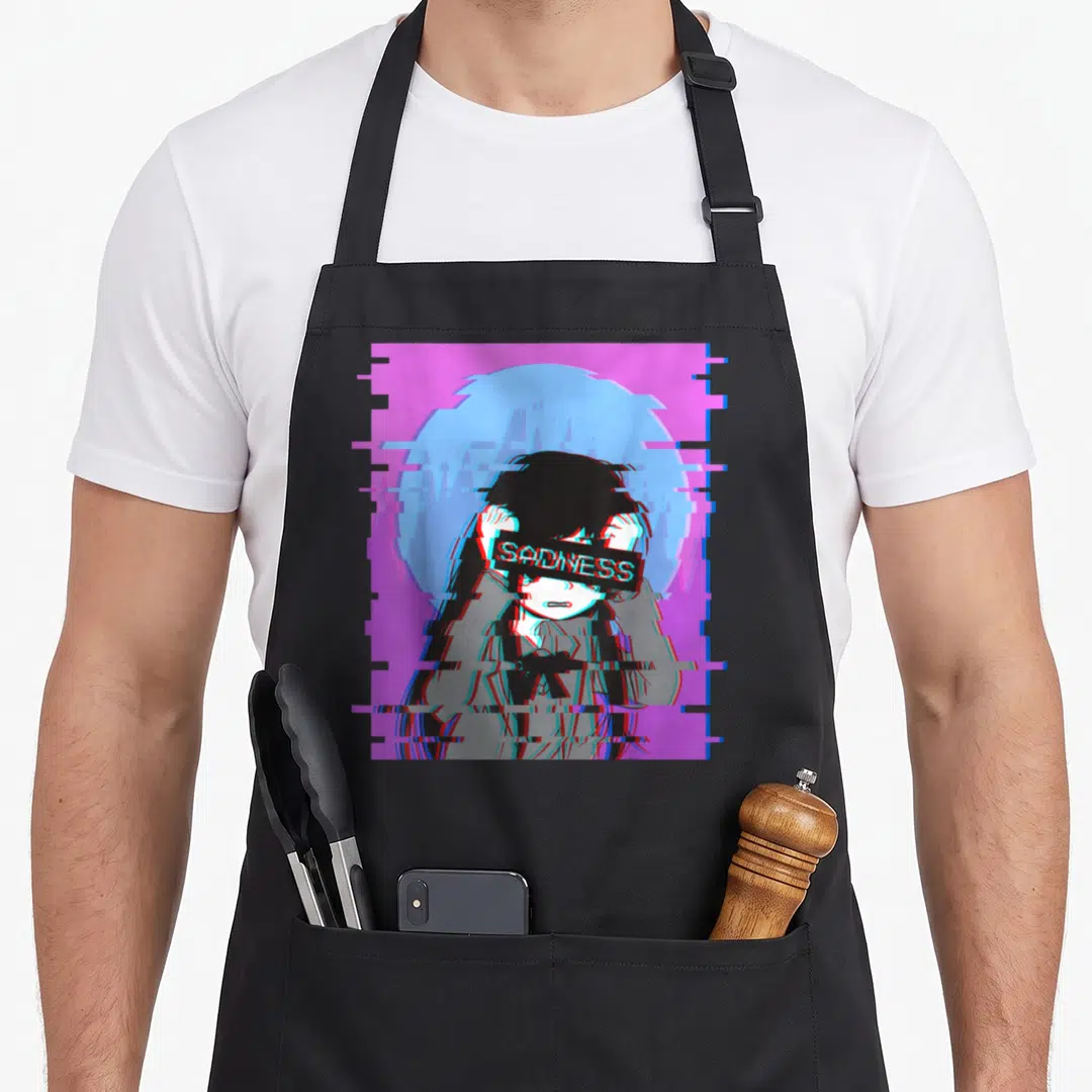 Sad japanese anime apron - Pixel art person holding black banner with SADNESS text over eyes, purple and blue glitch — shown on a black cotton canvas apron against a white background