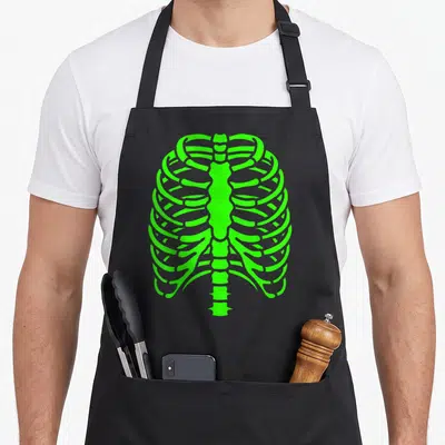Skeleton rib cage halloween apron - Neon green minimalist rib cage graphic centered on black bib apron — shown on a black cotton canvas apron against a white background