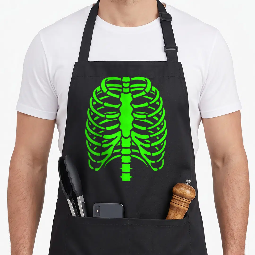 Skeleton rib cage halloween apron - Neon green minimalist rib cage graphic centered on black bib apron — shown on a black cotton canvas apron against a white background