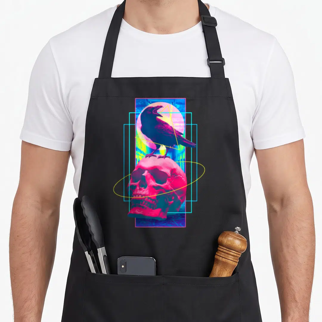 Vaporwave halloween apron - Raven on skull with magenta cyan yellow blue geometric shapes retro style — shown on a black cotton canvas apron against a white background