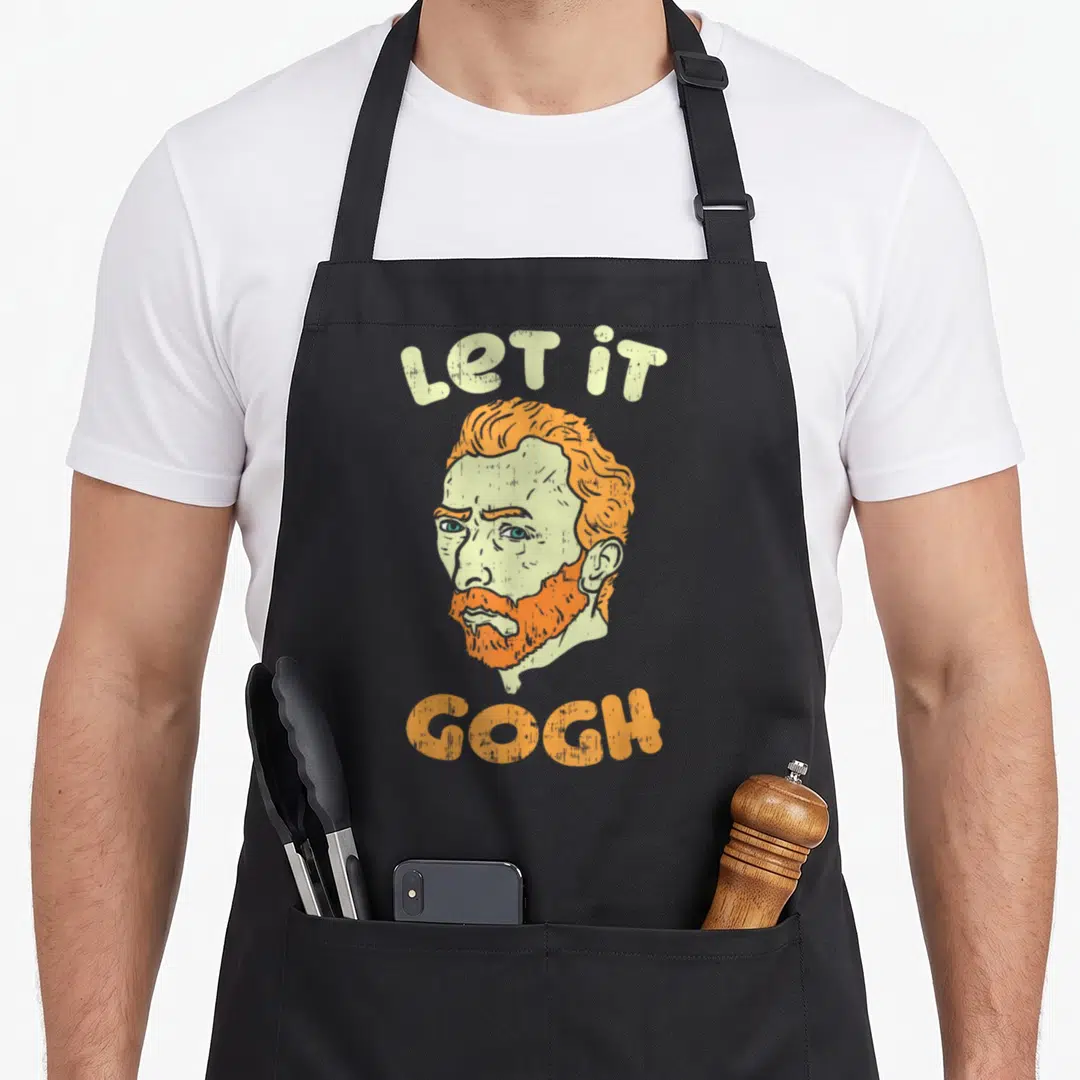 Gogh painter apron - Distressed portrait of Vincent van Gogh with orange hair and green skin under arched text — shown on a black cotton canvas apron against a white background