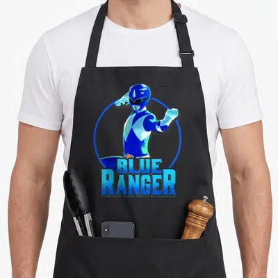 Blue karate apron - Blue Ranger character in fighting pose inside blue circle with bold text overlay — shown on a black cotton canvas apron against a white background