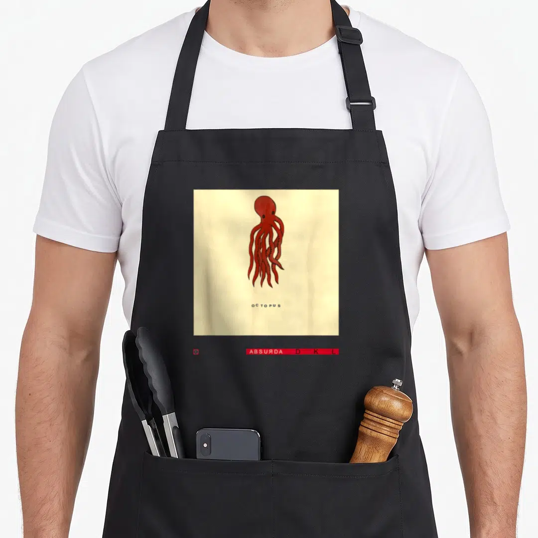 Studio david aprons - Red octopus illustration with spaced black text on cream background — shown on a black cotton canvas apron against a white background