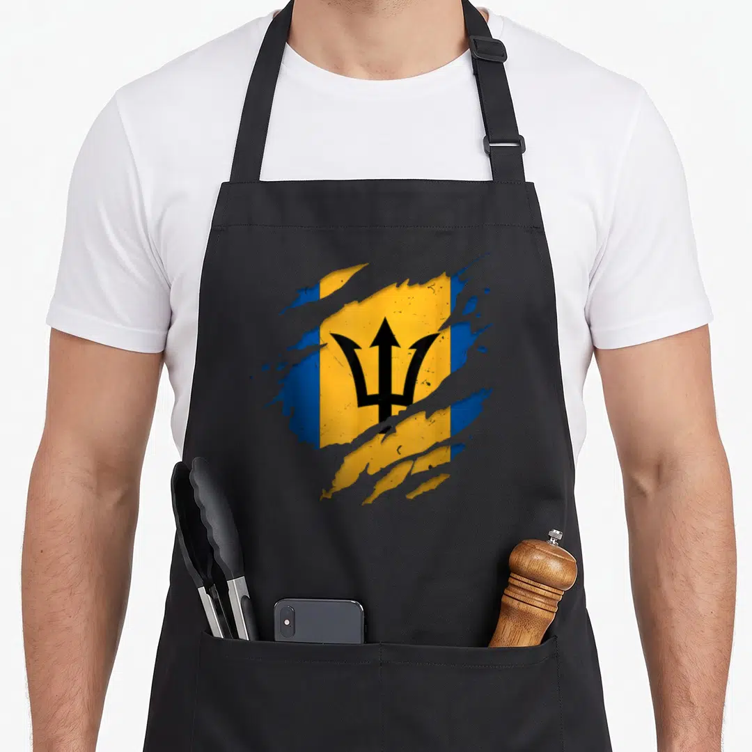 Barbadian torn apron - Realistic flag in blue, yellow, and black emerging from a torn surface — shown on a black cotton canvas apron against a white background
