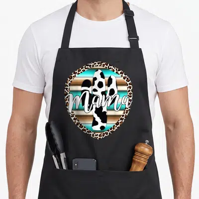 Western cow print apron - Spotted cactus with white mama script inside leopard border over teal stripes — shown on a black cotton canvas apron against a white background