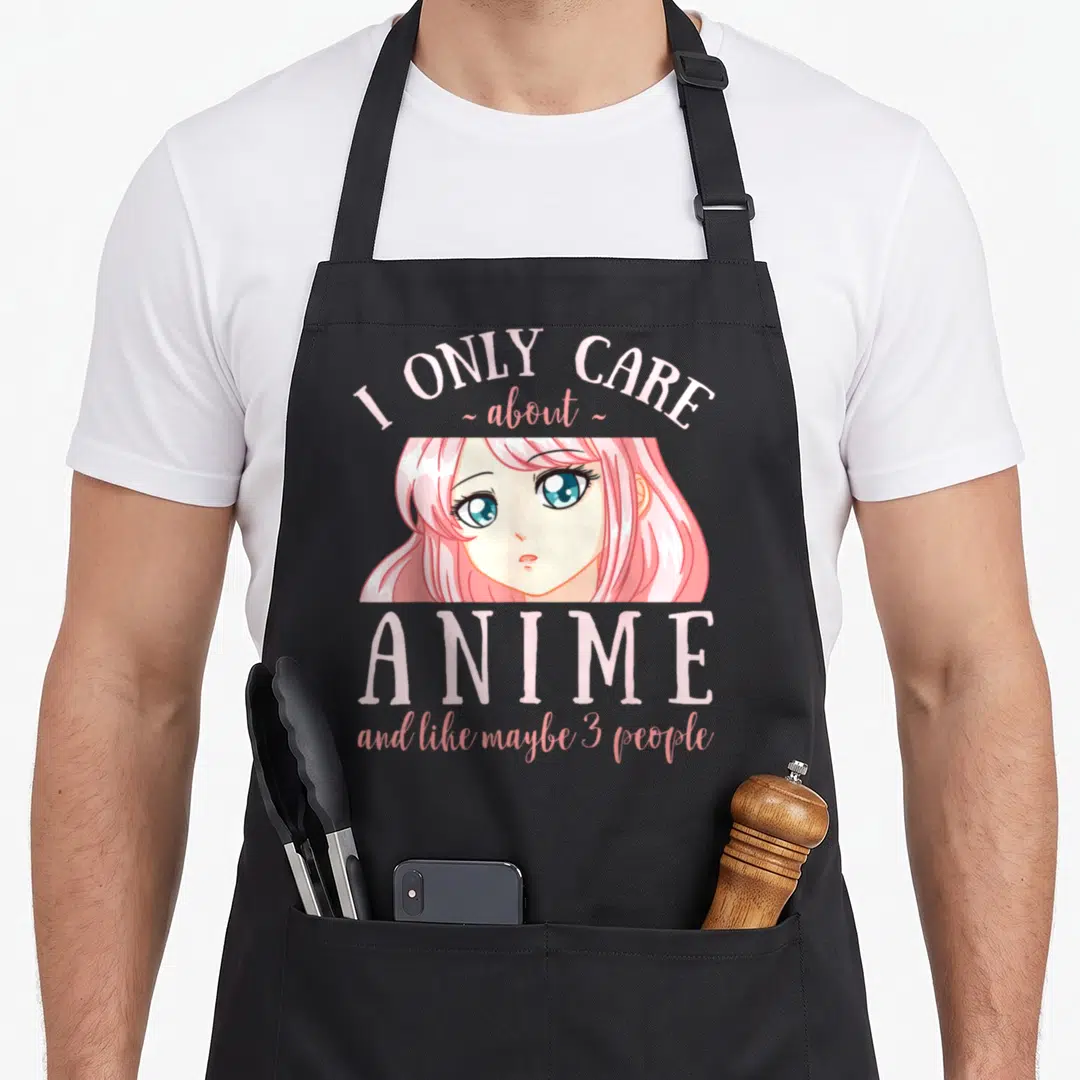 Maybe anime apron - Pink and white anime girl face with text I ONLY CARE about ANIME and like maybe 3 people — shown on a black cotton canvas apron against a white background