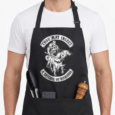 Eat bags and aprons - White distressed knight on horseback with arched text THOU MAY INGEST A SATCHEL OF RICHARDS — shown on a black cotton canvas apron against a white background