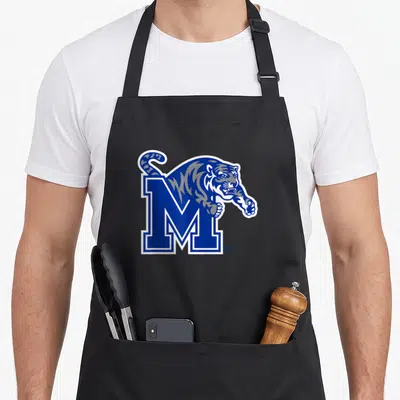 Tiger memphis apron - Blue cartoon tiger leaping over large blue letter M with white outline — shown on a black cotton canvas apron against a white background