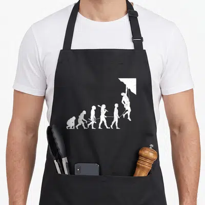 Solo bouldering apron - Distressed white evolution sequence ending in a hanging climber silhouette — shown on a black cotton canvas apron against a white background