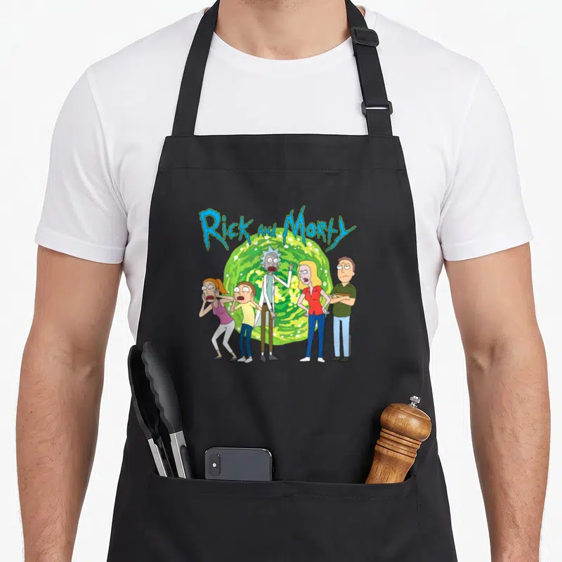 Portal personalized family aprons - Rick and Morty text above five cartoon characters standing before a green portal — shown on a black cotton canvas apron against a white background