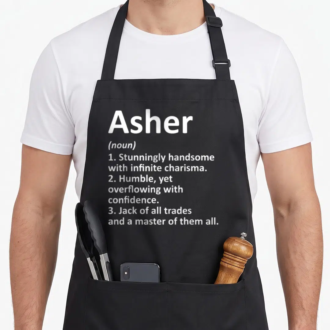 Asher father day aprons - White text defining Asher as handsome, humble, and a master of all trades stacked vertically — shown on a black cotton canvas apron against a white background