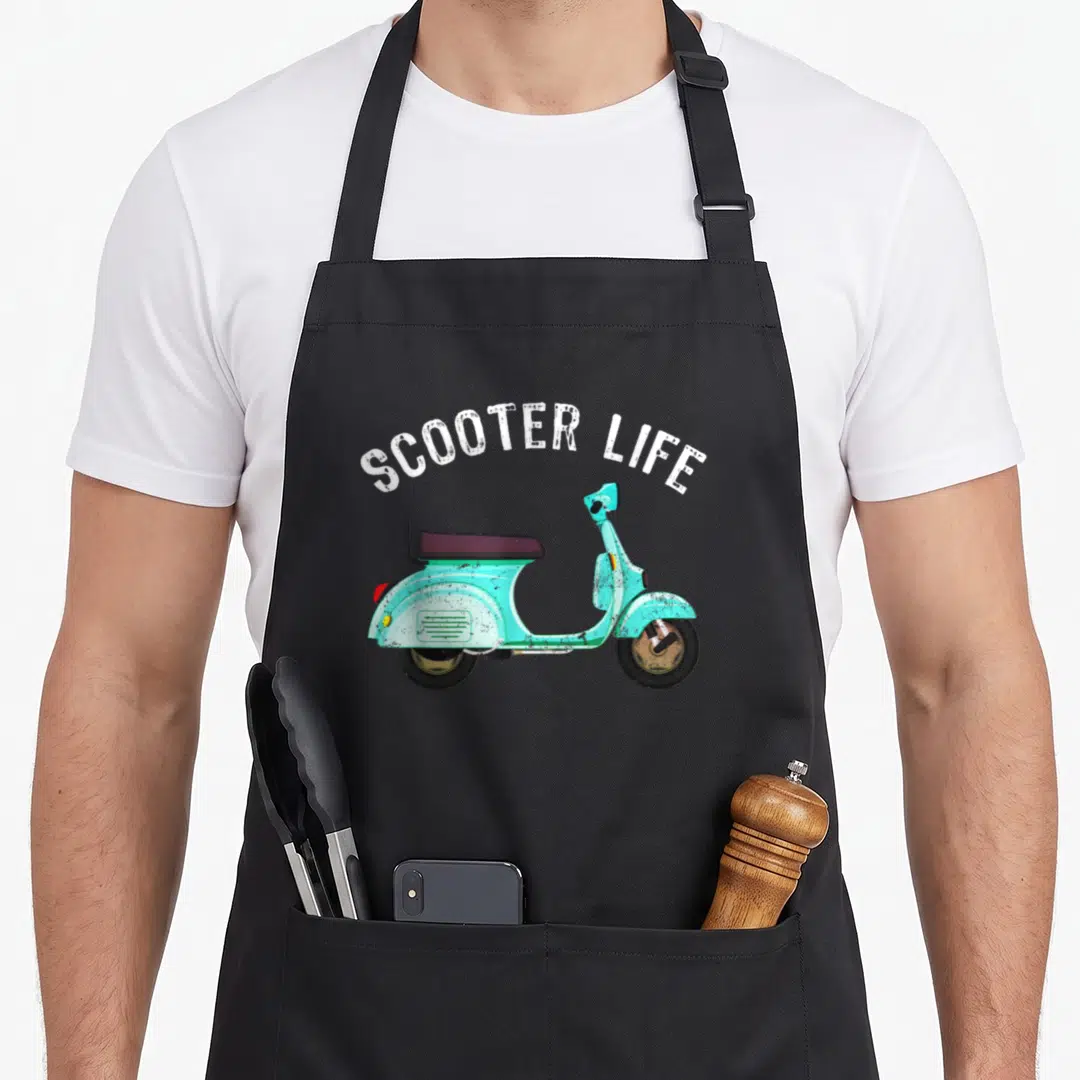 Wheel bike apron - Arched SCOOTER LIFE text over turquoise scooter with black tires and seat in cartoon style — shown on a black cotton canvas apron against a white background