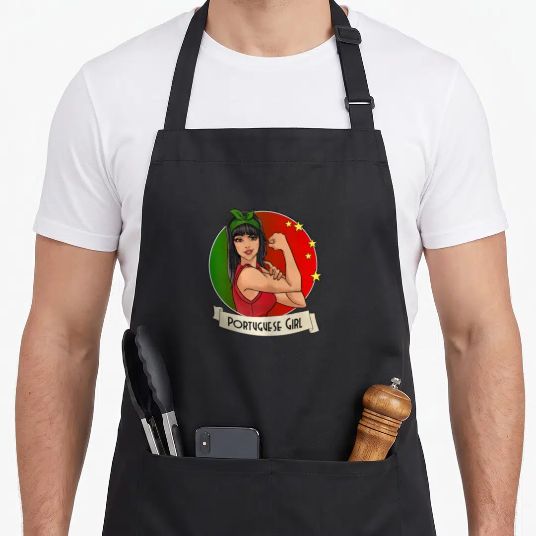 Retro portugal portuguese apron - Cartoon woman flexing arm on green red circle with five yellow stars and PORTUGUESE — shown on a black cotton canvas apron against a white background