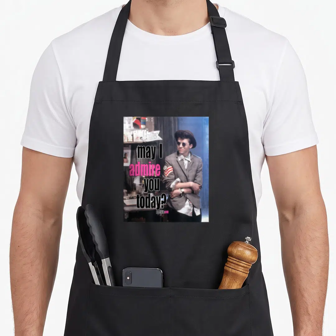 May pretty apron - Man in hat and glasses with text may I admire you today? and pretty in pink — shown on a black cotton canvas apron against a white background