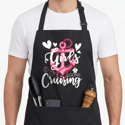 Gone cruiser girl apron - Pink anchor with white script Girl's GONE Cruising and sunglasses on black — shown on a black cotton canvas apron against a white background
