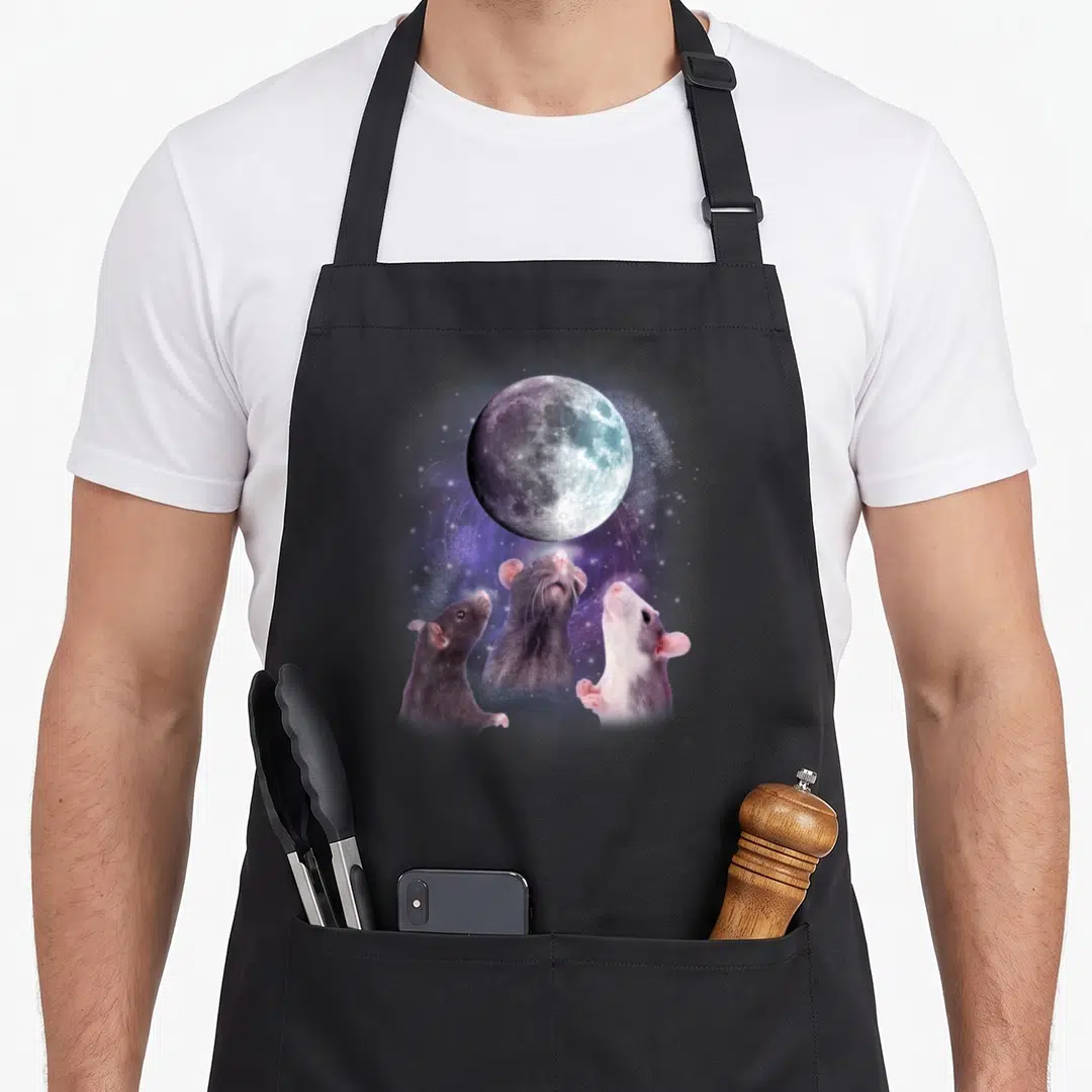 Howling crazy rat man apron - Three rats gazing at a large moon against a purple starry nebula background — shown on a black cotton canvas apron against a white background