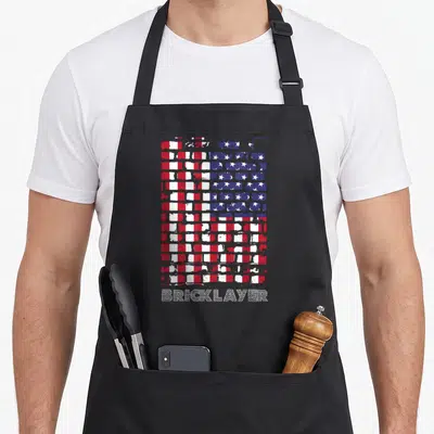 Bricklayer patriotic apron - Distressed brick wall in red white and blue with textured BRICKLAYER text below — shown on a black cotton canvas apron against a white background