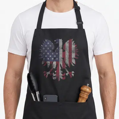 Fade polish aprons - Distressed eagle silhouette filled with red white and blue USA flag pattern — shown on a black cotton canvas apron against a white background