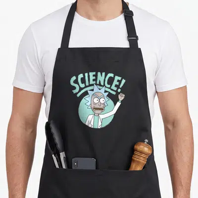 Fist science apron - Rick Sanchez raising a fist under arched blue SCIENCE! text on a light blue circle — shown on a black cotton canvas apron against a white background