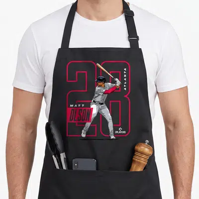 Matt baseball apron - Cartoon player holding bat in front of red number 20 with vertical ATLANTA text and Olson — shown on a black cotton canvas apron against a white background
