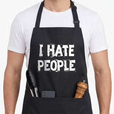 Hate antisocial apron - White distressed text reading I HATE PEOPLE stacked in two lines — shown on a black cotton canvas apron against a white background