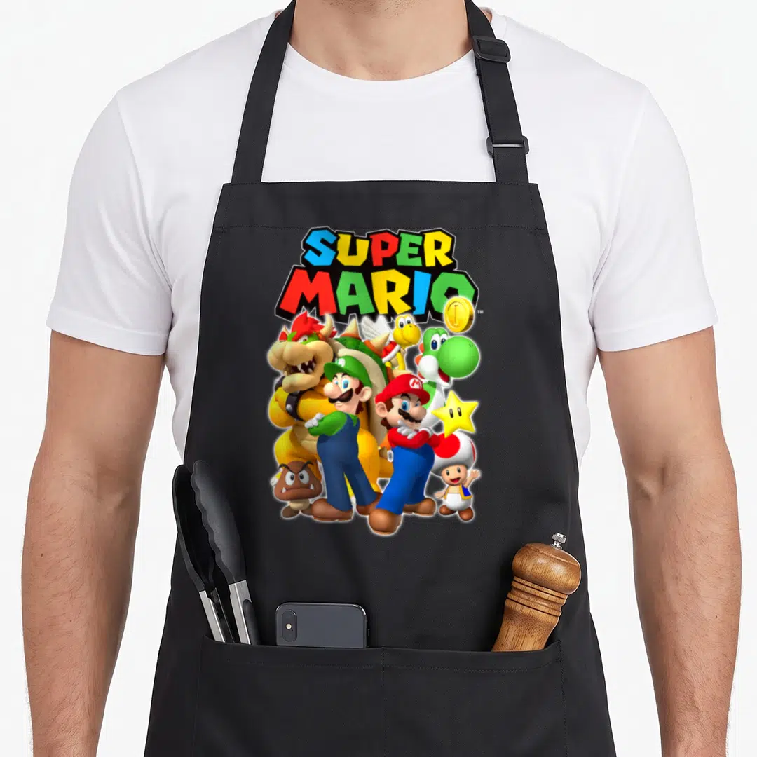 Original shot apron - Super Mario logo with Mario, Luigi, Bowser, Yoshi, Toad, Goomba, and a gold coin in cartoon art — shown on a black cotton canvas apron against a white background