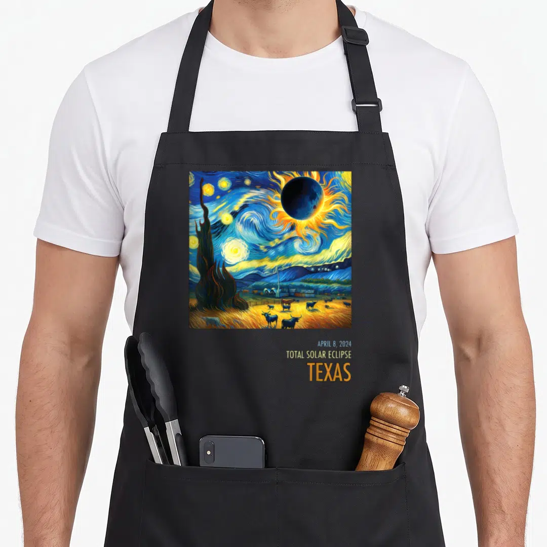 Total texas apron - Watercolor landscape with cattle under a dark moon and text April 8 2024 Total Solar Eclipse Texas — shown on a black cotton canvas apron against a white background