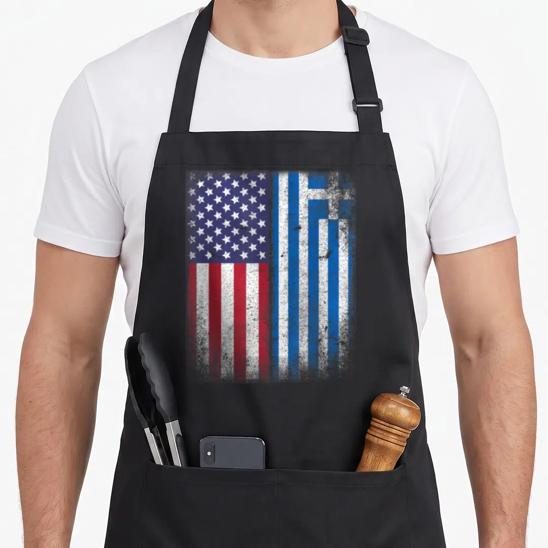 Greek american flag apron - Split vertical American and Greek flags in distressed red white blue without text — shown on a black cotton canvas apron against a white background