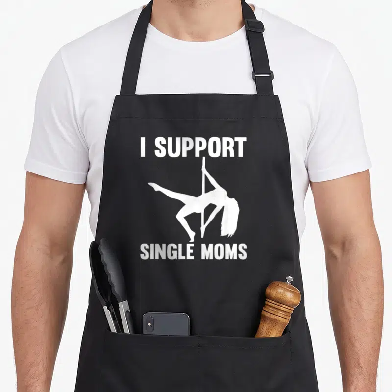 Support rude aprons - White pole dancer silhouette between I SUPPORT and SINGLE MOMS text — shown on a black cotton canvas apron against a white background