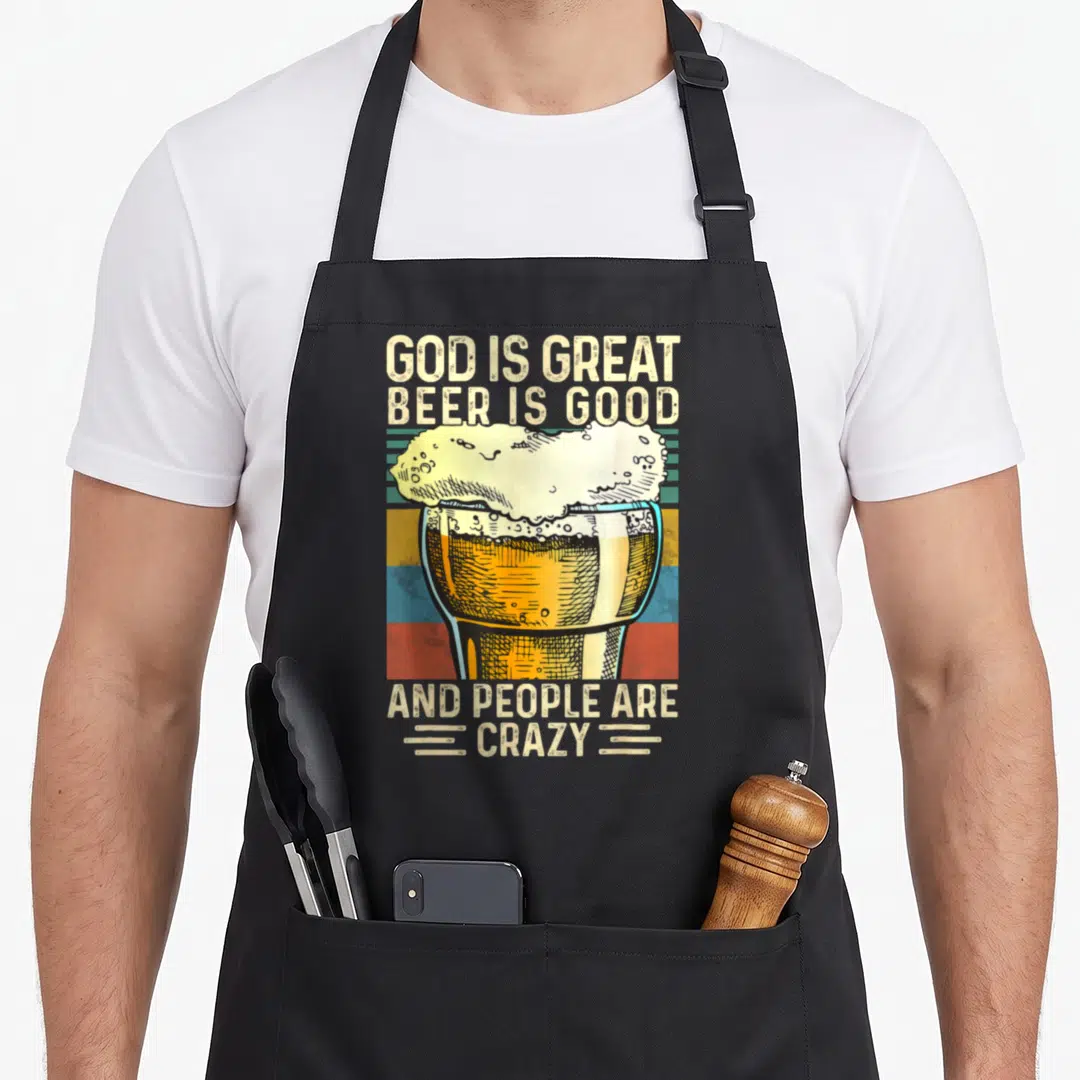 Vintage god beer apron - Retro beer glass with text God Is Great Beer Is Good And People Are Crazy on colored stripes — shown on a black cotton canvas apron against a white background