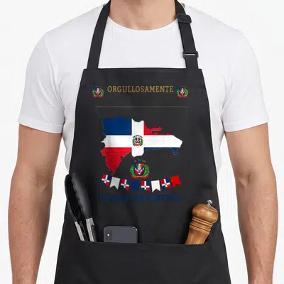 Dominicana hispanic aprons - Orgullosamente Dominicana map with flag colors and coats of arms — shown on a black cotton canvas apron against a white background