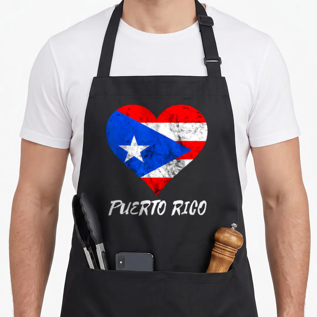 Perto rican girl apron - Distressed heart filled with Puerto Rican flag colors above PUERTO RICO text — shown on a black cotton canvas apron against a white background